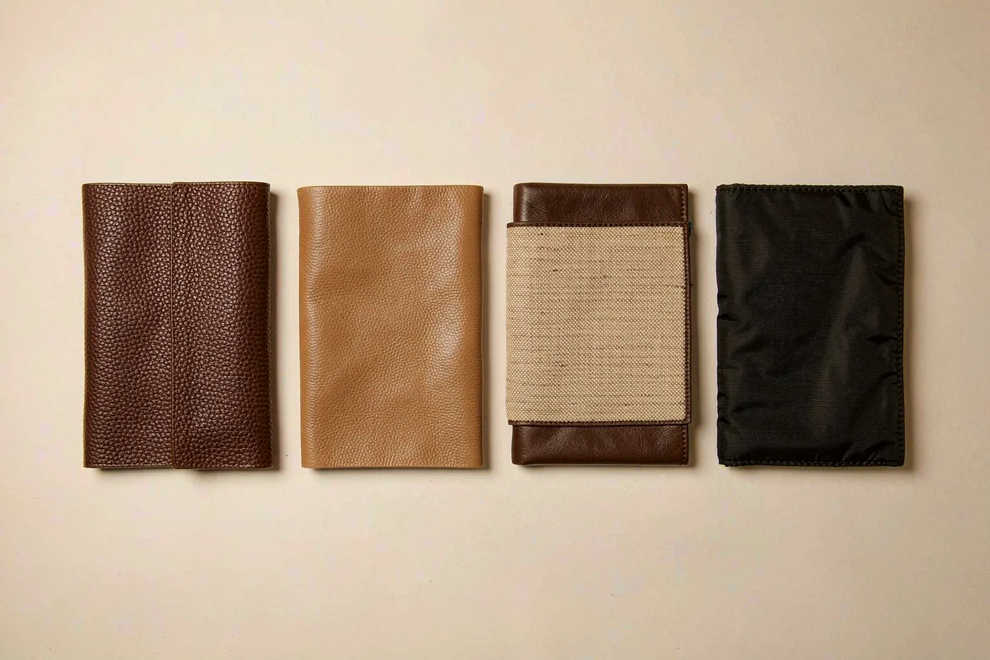 Comparison of four handbag materials: full-grain leather, top-grain leather, coated canvas, and nylon